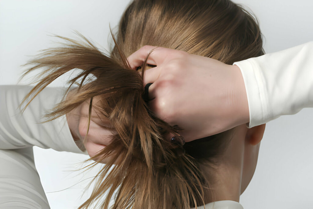 You should tie your hair with a scrunchie during the test.